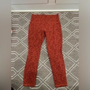 Athleta Salutation Stash Pocket 7/8 tight Sz. M